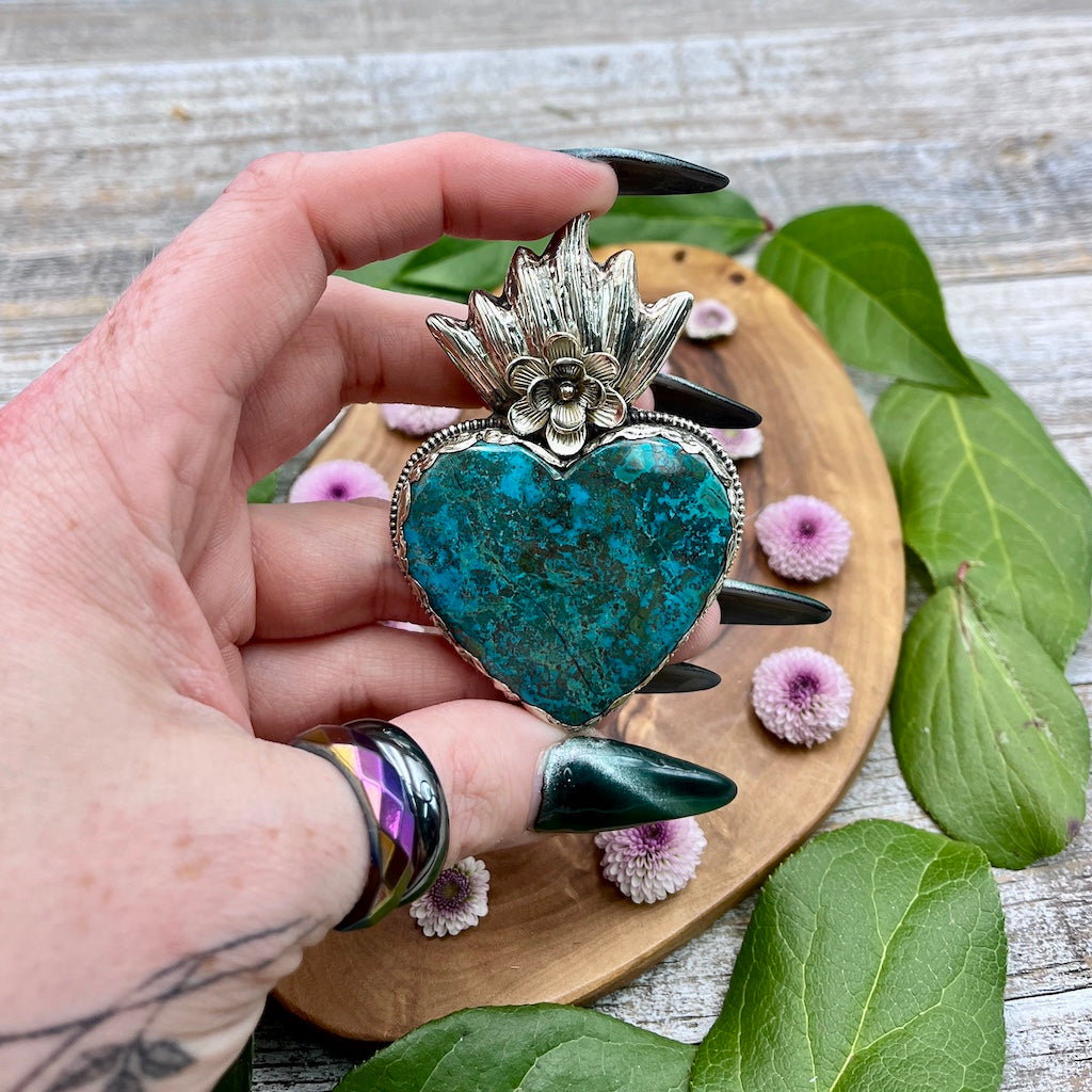 Chrysocolla Sacred Heart Pendant in hand