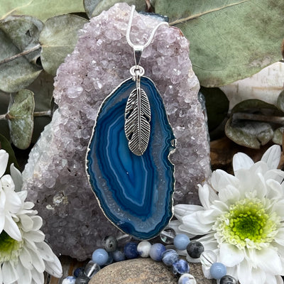 Blue Ocean Agate slab necklace with feather closeup
