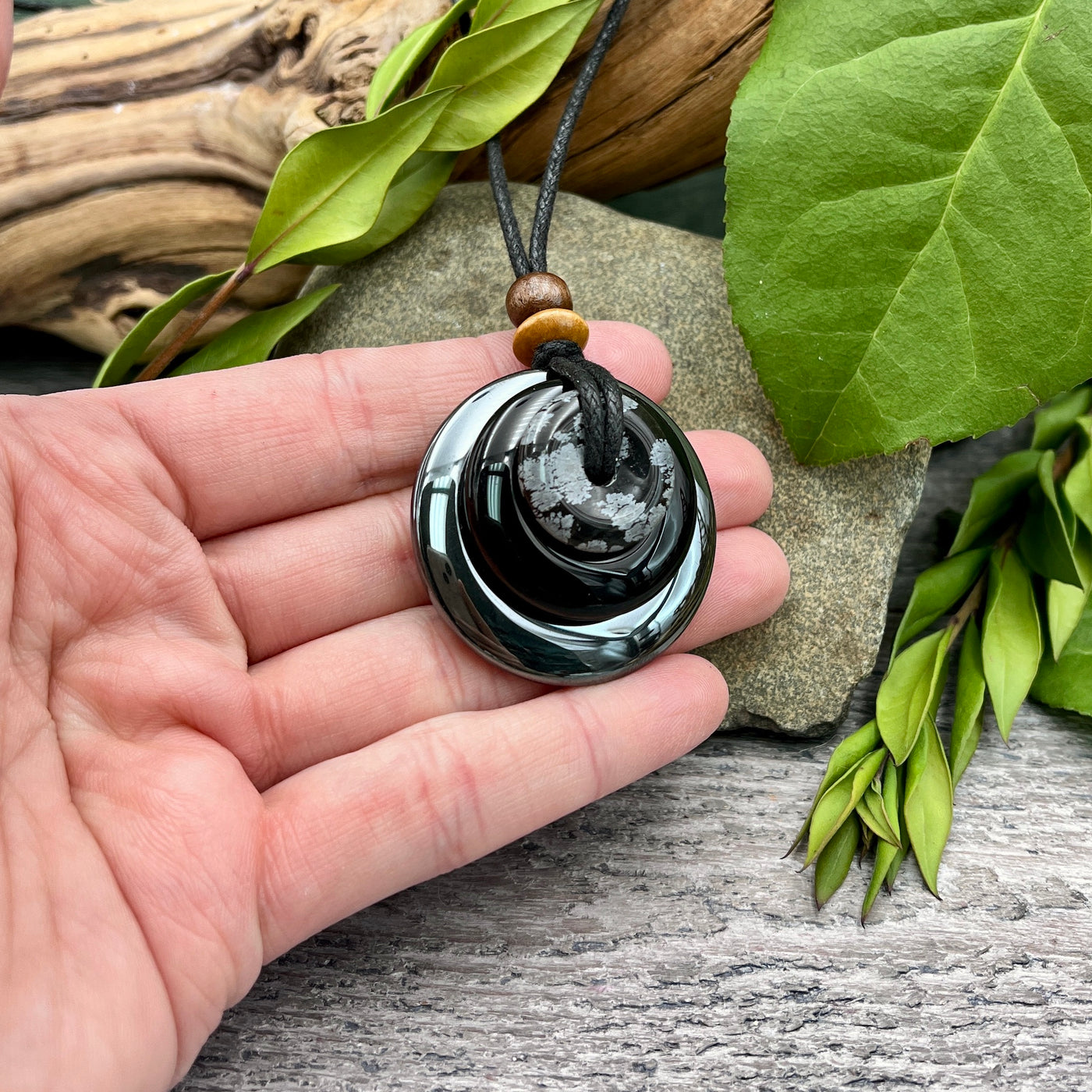 Coat of Armor Circles of Power Necklace hand