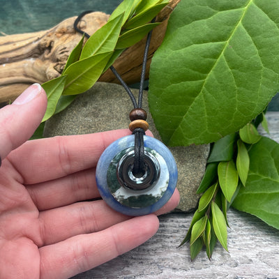 Roots and Wings Circles of Power Necklace hand