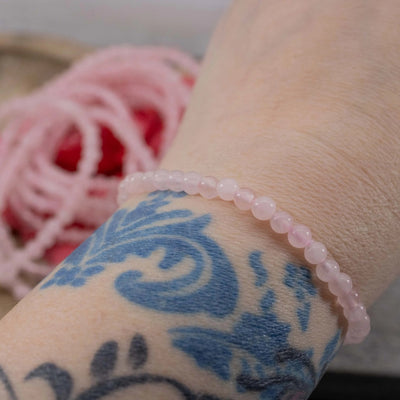 Rose Quartz Bracelet shown on wrist